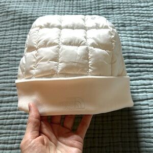 The North Face puff beanie